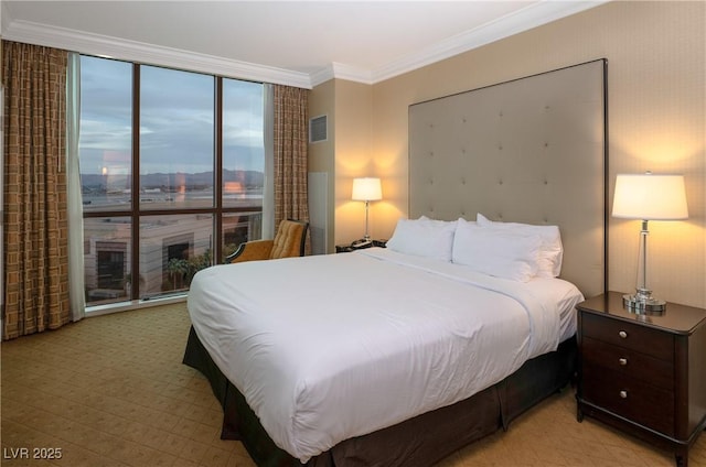 145 E Harmon Ave Unit 1120, Las Vegas, NV 89109 - bedroom featuring ornamental molding and expansive windows