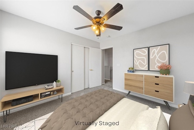 9312 Straw Hays St Unit 103, Las Vegas, NV 89178 - bedroom featuring carpet, a closet, and a ceiling fan