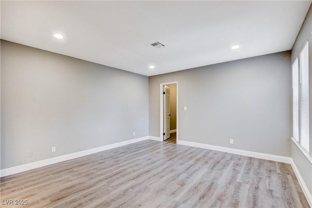 3971 Foxboro Cir, Las Vegas, NV 89121 - empty room featuring light wood-style flooring, baseboards, and recessed lighting