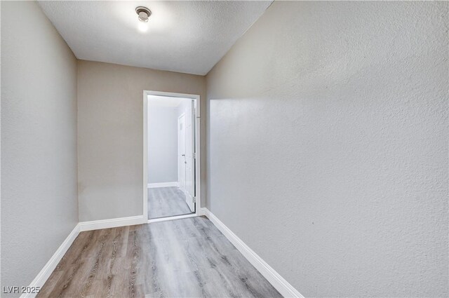 3971 Foxboro Cir, Las Vegas, NV 89121 - empty room with wood finished floors and baseboards