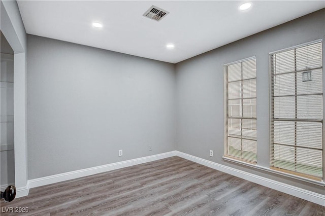 3971 Foxboro Cir, Las Vegas, NV 89121 - empty room featuring wood finished floors, baseboards, and recessed lighting