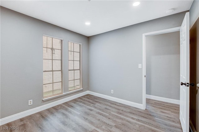 3971 Foxboro Cir, Las Vegas, NV 89121 - unfurnished room with wood finished floors, baseboards, and recessed lighting