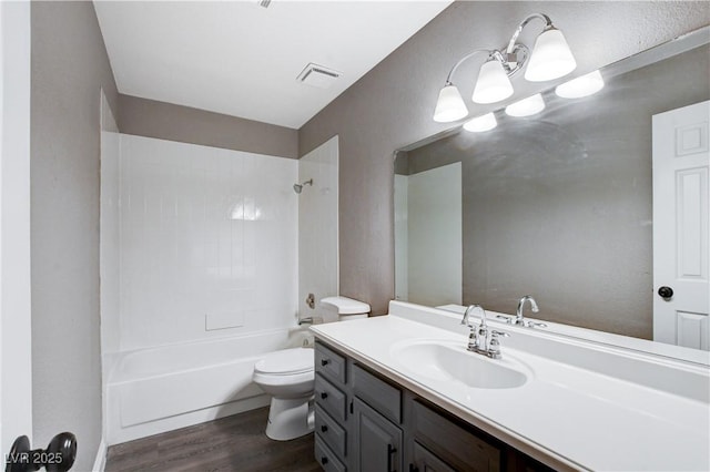 3971 Foxboro Cir, Las Vegas, NV 89121 - full bathroom with toilet, wood finished floors, vanity, and shower / bathtub combination