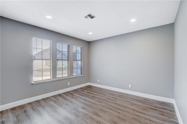 3971 Foxboro Cir, Las Vegas, NV 89121 - empty room featuring wood finished floors, baseboards, and recessed lighting
