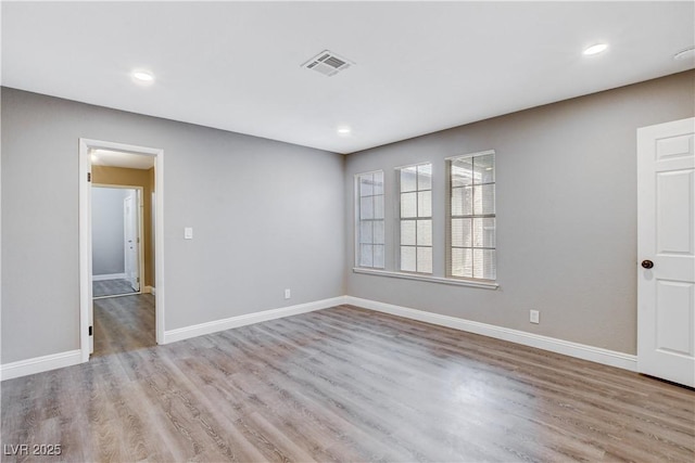 3971 Foxboro Cir, Las Vegas, NV 89121 - empty room with wood finished floors, baseboards, and recessed lighting