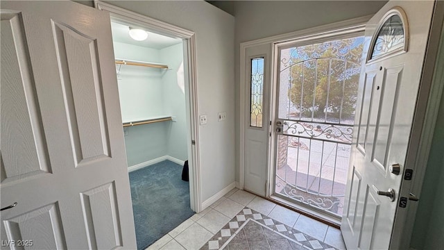 3451 Sagebrush Ave, Pahrump, NV 89048 - foyer featuring light tile patterned floors and baseboards