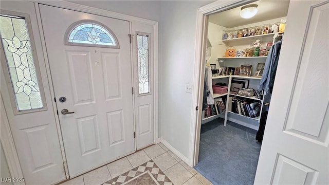 3451 Sagebrush Ave, Pahrump, NV 89048 - foyer entrance featuring light tile patterned floors and baseboards