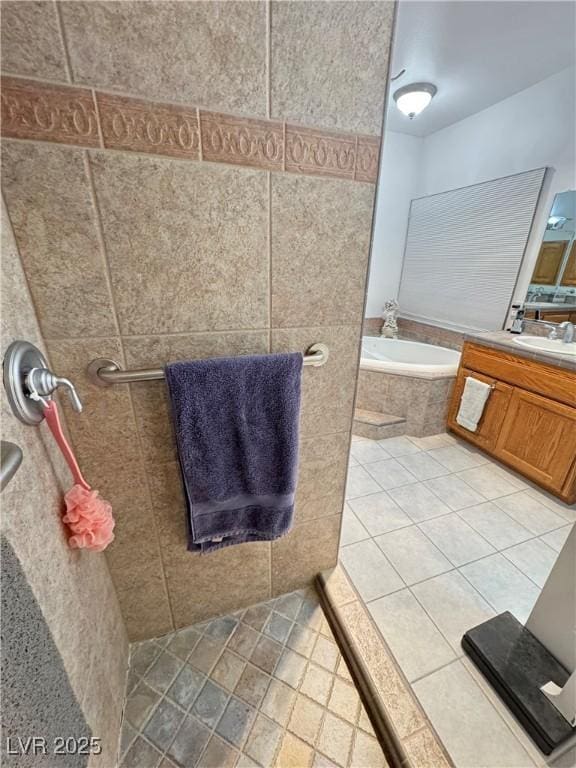 3451 Sagebrush Ave, Pahrump, NV 89048 - bathroom with tile patterned floors, a bath, vanity, and a tile shower