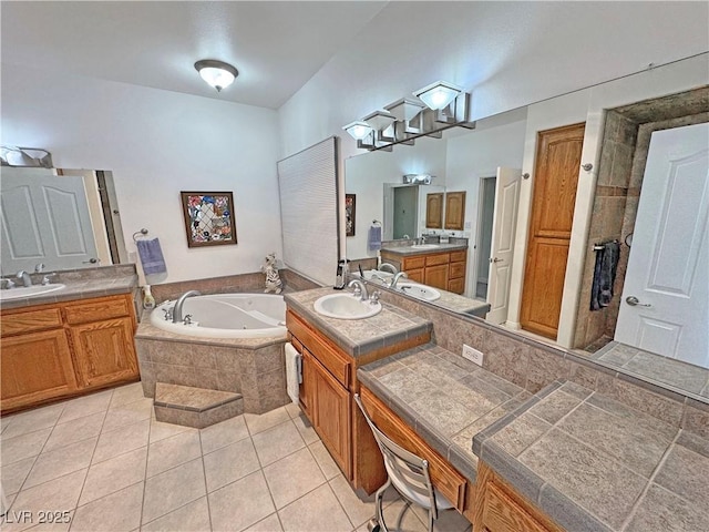 3451 Sagebrush Ave, Pahrump, NV 89048 - bathroom with a whirlpool tub, two vanities, and tile patterned floors