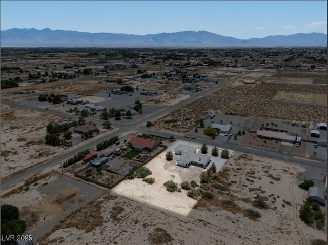 3451 Sagebrush Ave, Pahrump, NV 89048 - drone / aerial view of a mountain backdrop and a desert landscape
