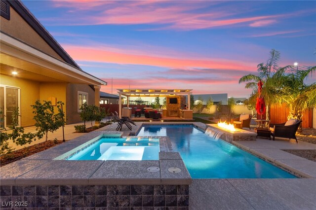 6980 W Meranto Ave, Las Vegas, NV 89178 - pool at dusk featuring an outdoor living space with a fire pit, a patio, and a pool with connected hot tub