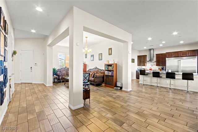 6980 W Meranto Ave, Las Vegas, NV 89178 - living area featuring wood finish floors, a chandelier, and recessed lighting