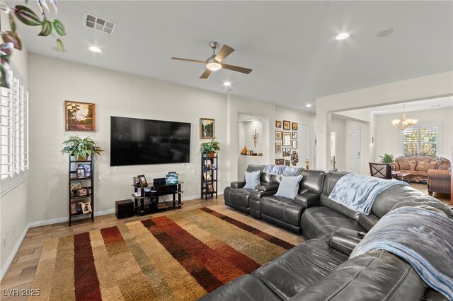 6980 W Meranto Ave, Las Vegas, NV 89178 - living room with a chandelier, a ceiling fan, light wood-type flooring, and recessed lighting
