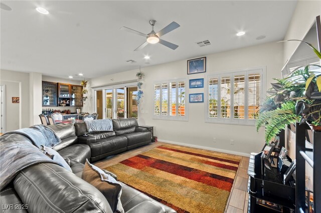 6980 W Meranto Ave, Las Vegas, NV 89178 - living room featuring a ceiling fan, recessed lighting, and bar