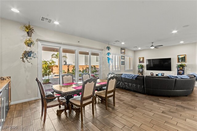 6980 W Meranto Ave, Las Vegas, NV 89178 - dining room with wood finish floors, healthy amount of natural light, a ceiling fan, and recessed lighting