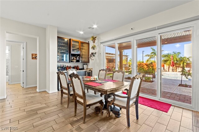 6980 W Meranto Ave, Las Vegas, NV 89178 - dining room with light wood-style floors and recessed lighting