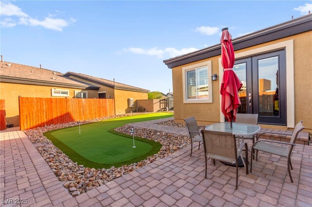 6980 W Meranto Ave, Las Vegas, NV 89178 - view of patio featuring a putting green