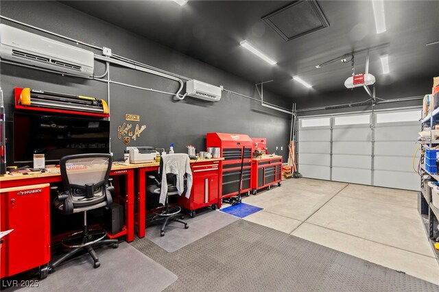 6980 W Meranto Ave, Las Vegas, NV 89178 - garage featuring a wall mounted air conditioner, a garage door opener, and an office area