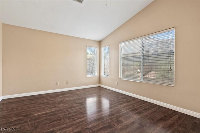 5 Spur Cross Cir, Henderson, NV 89012 - empty room featuring baseboards, vaulted ceiling, dark wood-type flooring, and ceiling fan