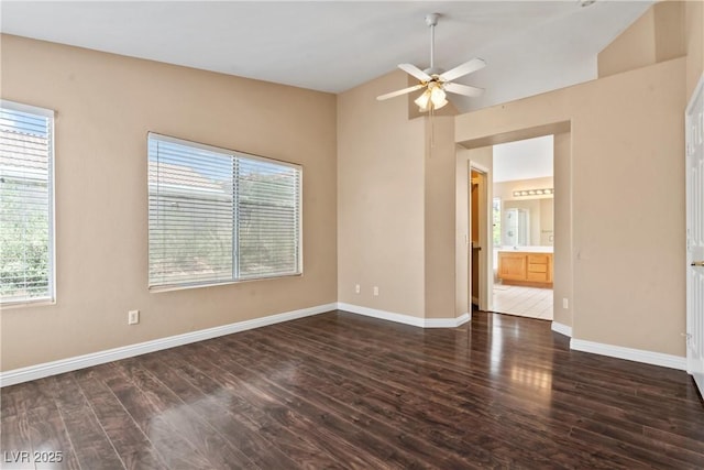 5 Spur Cross Cir, Henderson, NV 89012 - empty room with wood finished floors, a ceiling fan, baseboards, and lofted ceiling