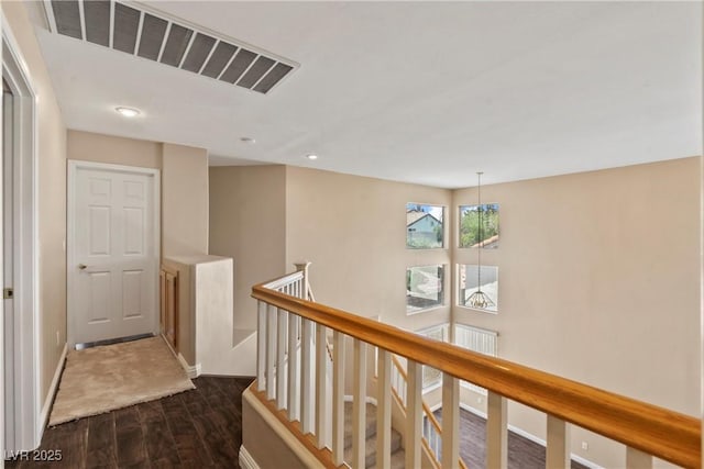 5 Spur Cross Cir, Henderson, NV 89012 - hall featuring dark wood-style floors, an upstairs landing, baseboards, and recessed lighting