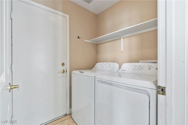 5 Spur Cross Cir, Henderson, NV 89012 - washroom featuring washing machine and dryer and light tile patterned floors