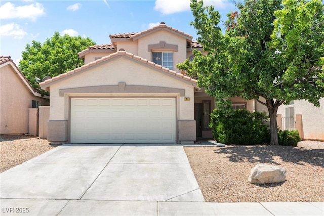 5 Spur Cross Cir, Henderson, NV 89012 - mediterranean / spanish house with a tiled roof, concrete driveway, a garage, and stucco siding