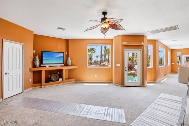 9111 W Stephen Ave, Las Vegas, NV 89149 - unfurnished living room with carpet, a ceiling fan, and baseboards