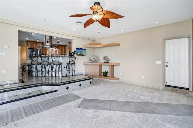 9111 W Stephen Ave, Las Vegas, NV 89149 - carpeted living room with a ceiling fan, recessed lighting, and baseboards