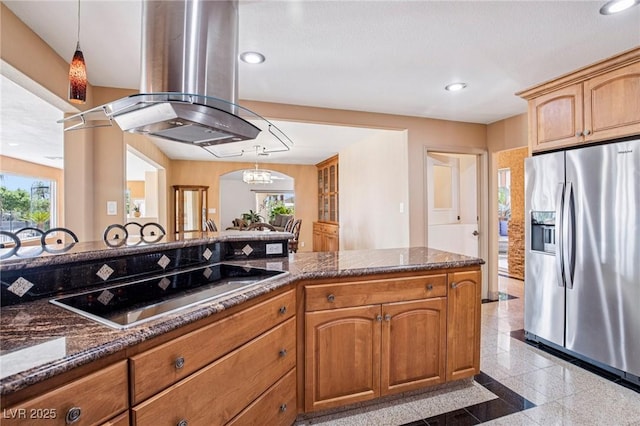 9111 W Stephen Ave, Las Vegas, NV 89149 - kitchen with stainless steel fridge with ice dispenser, island exhaust hood, dark stone counters, recessed lighting, and granite tiled floors