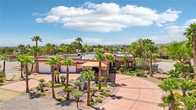 9111 W Stephen Ave, Las Vegas, NV 89149 - view of front of home with concrete driveway, a garage, and stucco siding