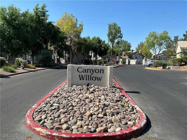 5222 Mandalay Springs Dr Unit 202, Las Vegas, NV 89120 - view of asphalt street with curbs and a residential view