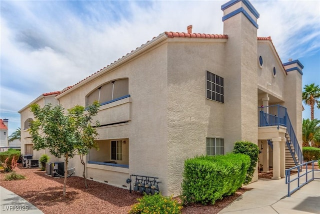 2725 S Nellis Blvd Unit 2168, Las Vegas, NV 89121 - view of building exterior with central AC unit and stairs