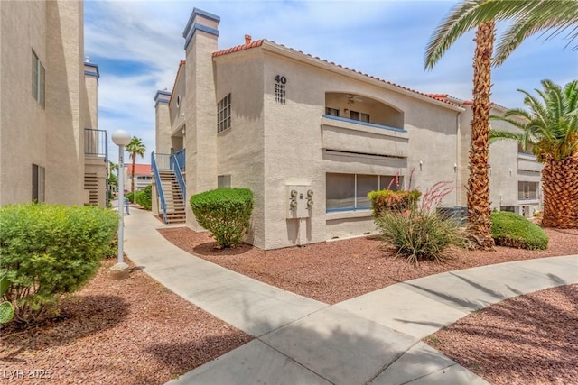 2725 S Nellis Blvd Unit 2168, Las Vegas, NV 89121 - view of building exterior featuring stairs