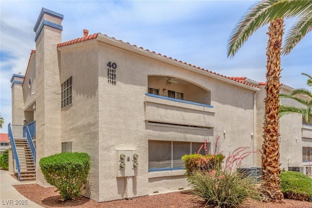 2725 S Nellis Blvd Unit 2168, Las Vegas, NV 89121 - view of building exterior featuring stairs