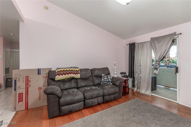 2725 S Nellis Blvd Unit 2168, Las Vegas, NV 89121 - living room with lofted ceiling and wood finished floors