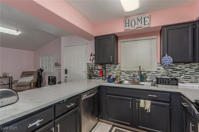 2725 S Nellis Blvd Unit 2168, Las Vegas, NV 89121 - kitchen featuring dishwasher, tasteful backsplash, light countertops, and vaulted ceiling