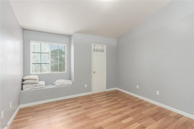 2725 S Nellis Blvd Unit 2168, Las Vegas, NV 89121 - empty room featuring light wood-style floors and baseboards