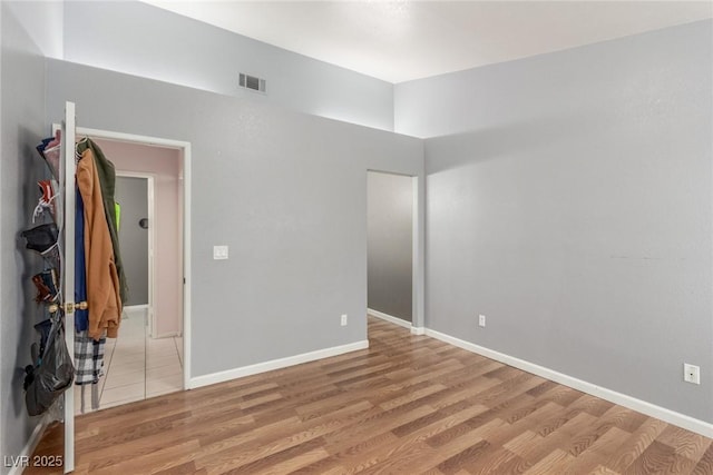 2725 S Nellis Blvd Unit 2168, Las Vegas, NV 89121 - empty room with light wood-type flooring and baseboards