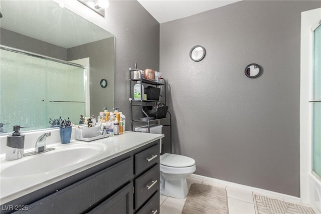 2725 S Nellis Blvd Unit 2168, Las Vegas, NV 89121 - full bath featuring an enclosed shower, vanity, toilet, tile patterned floors, and a textured wall