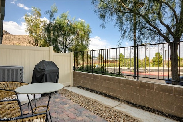 3880 Enchanted Sky St, Las Vegas, NV 89129 - view of patio featuring grilling area