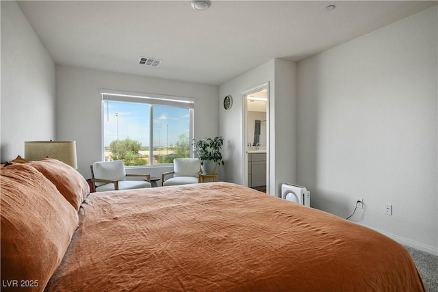 3880 Enchanted Sky St, Las Vegas, NV 89129 - carpeted bedroom with baseboards