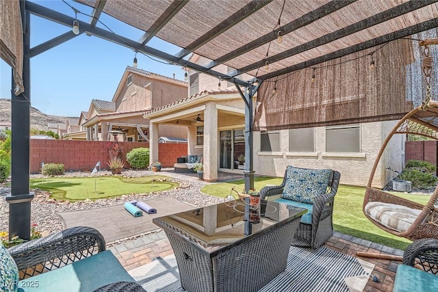 9853 Bangalore Ct, Las Vegas, NV 89148 - view of patio / terrace with a putting green, a pergola, an outdoor hangout area, and a ceiling fan
