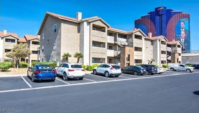 4200 S Valley View Blvd Unit 2081, Las Vegas, NV 89103 - view of apartment building / complex with uncovered parking