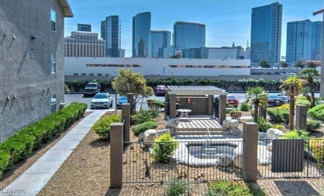 4200 S Valley View Blvd Unit 2081, Las Vegas, NV 89103 - view of home's community with a view of skyline and a pergola