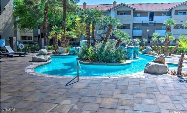 4200 S Valley View Blvd Unit 2081, Las Vegas, NV 89103 - community pool featuring a patio
