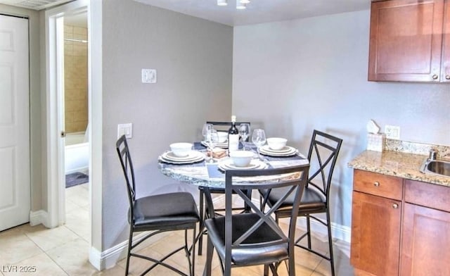 4200 S Valley View Blvd Unit 2081, Las Vegas, NV 89103 - dining space featuring light tile patterned floors and baseboards