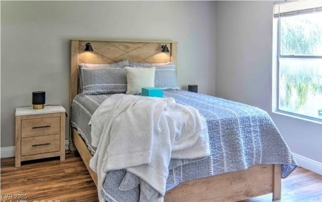 4200 S Valley View Blvd Unit 2081, Las Vegas, NV 89103 - bedroom with wood finished floors and baseboards