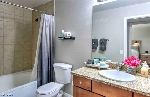 4200 S Valley View Blvd Unit 2081, Las Vegas, NV 89103 - full bath featuring vanity, shower / bath combo, toilet, connected bathroom, and a textured wall