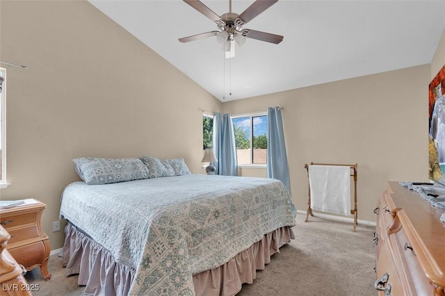 4628 Standing Bluff Way, Las Vegas, NV 89130 - bedroom featuring light carpet, baseboards, lofted ceiling, and ceiling fan